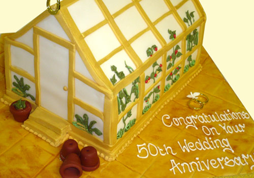 50th Wedding Anniversary cake shaped like a greenhouse